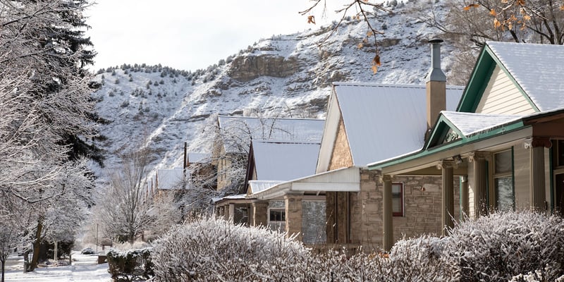 Snowy neighborhood of homes in the Colorado real estate market