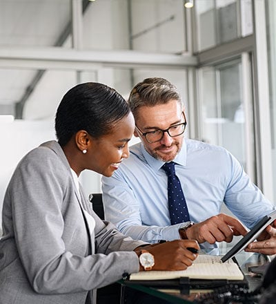 Loan advisor and client discussing project