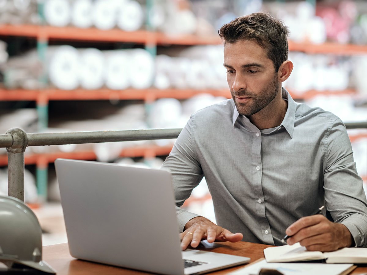 man making a payment on laptop