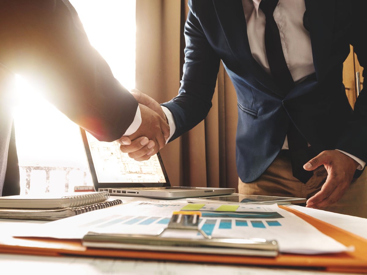 shaking hands to conclude loan deal