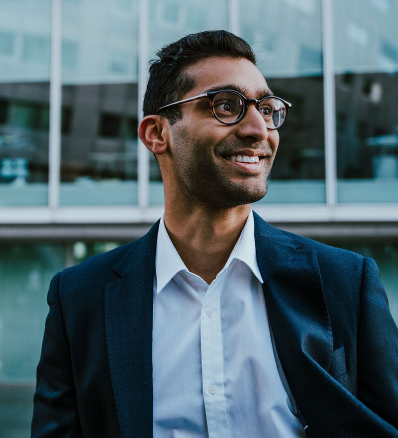 businessman walking through the city