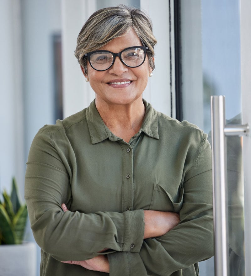 woman in glasses smiling
