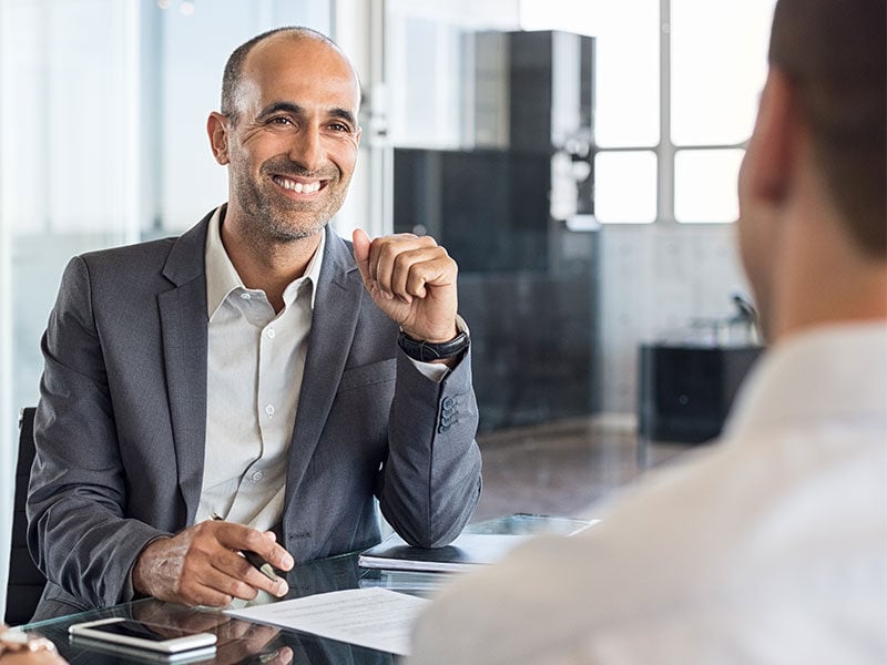 Socotra Capital agent smiling to client